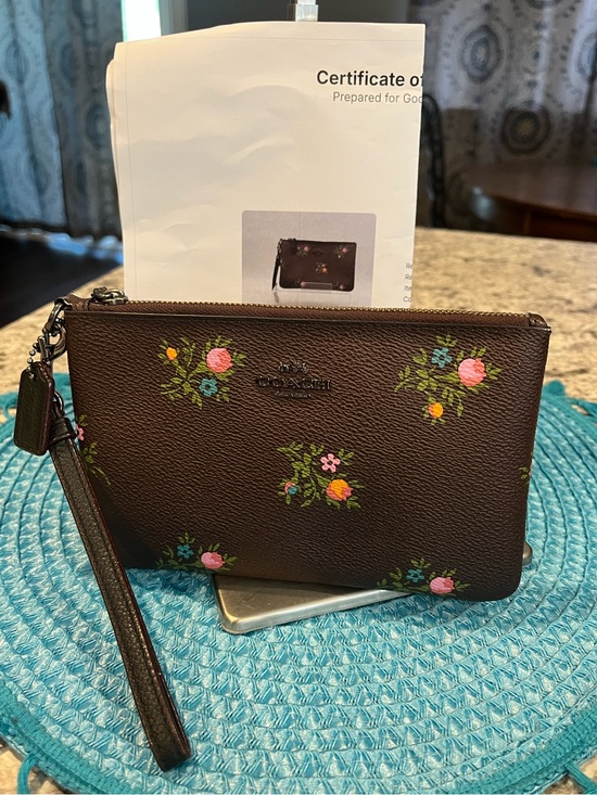 Coach Handbags - Coach Floral Wristlet with Hangtag